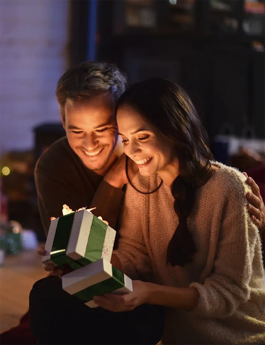 A couple at home in a Christmas setting